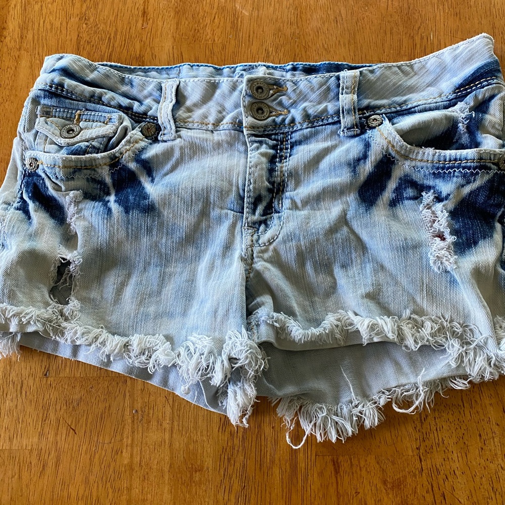 Jean shorts, worn, low rise.